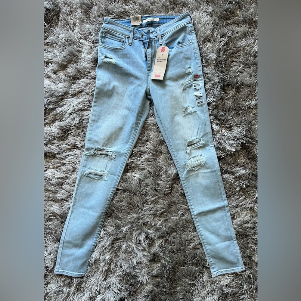 NEVER WORN LEVI’S 721 JEANS